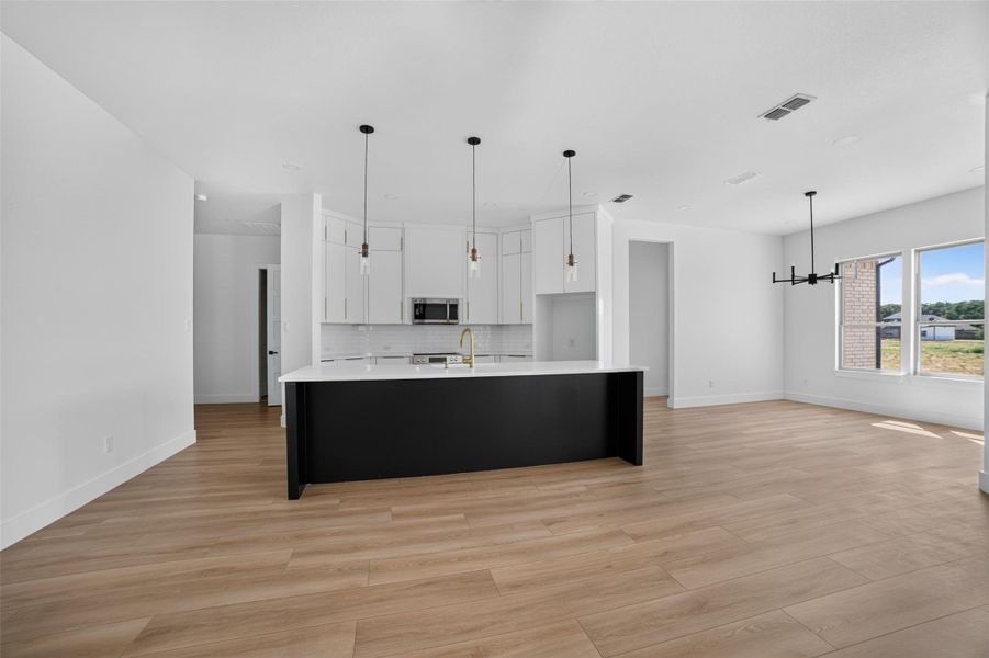 Furnished interior view inside a new home in , Lone Oak (Image 11). Furnished interior view inside a new home in , Lone Oak (Image 11).