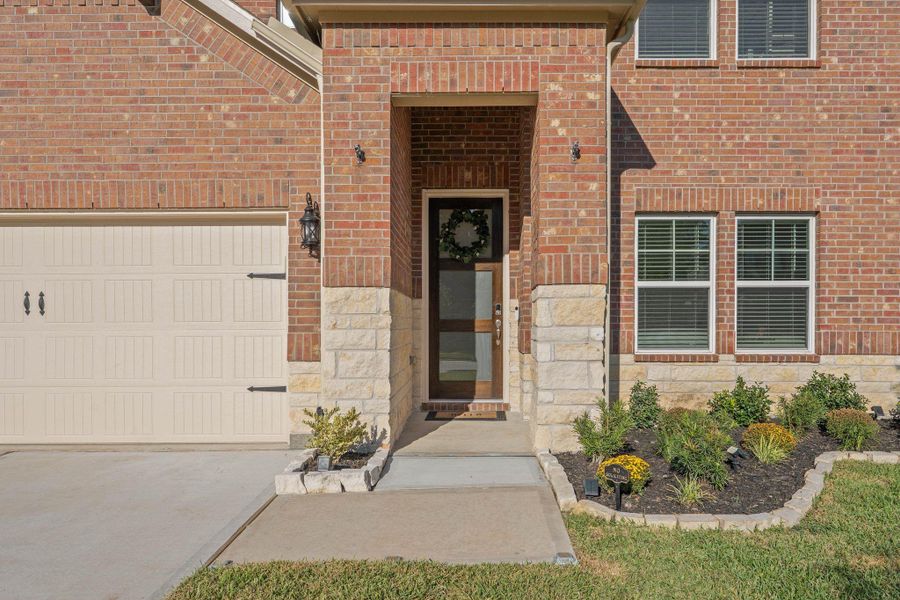 Exterior details and patio area of a home in Pine Lake Cove - Classic Series, Montgomery (Image 2). Exterior details and patio area of a home in Pine Lake Cove - Classic Series, Montgomery (Image 2).