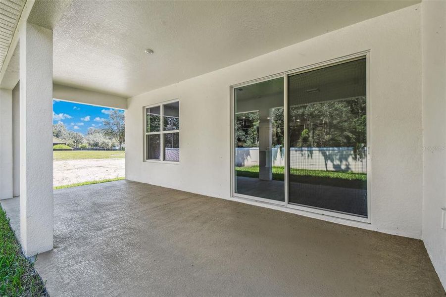 Exterior details and patio area of a home in Cascades at Southern Hills, Brooksville (Image 4). Exterior details and patio area of a home in Cascades at Southern Hills, Brooksville (Image 4).