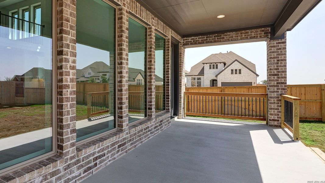 Exterior details and patio area of a home in Ladera, San Antonio (Image 24).