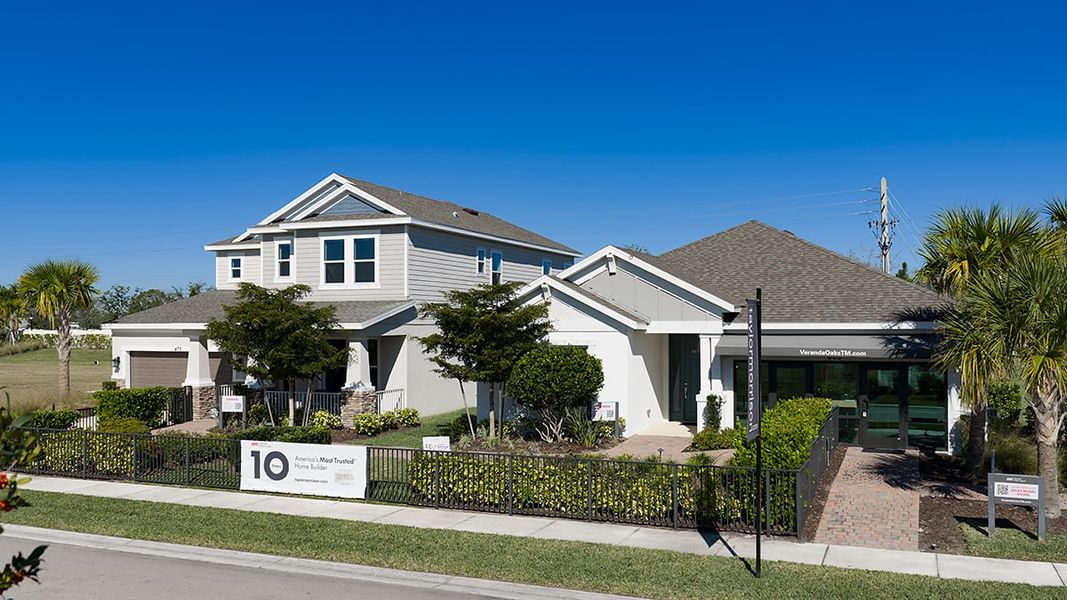 Front exterior of a new home in Veranda Oaks, Port St. Lucie, FL, highlighting curb appeal (Image 17).