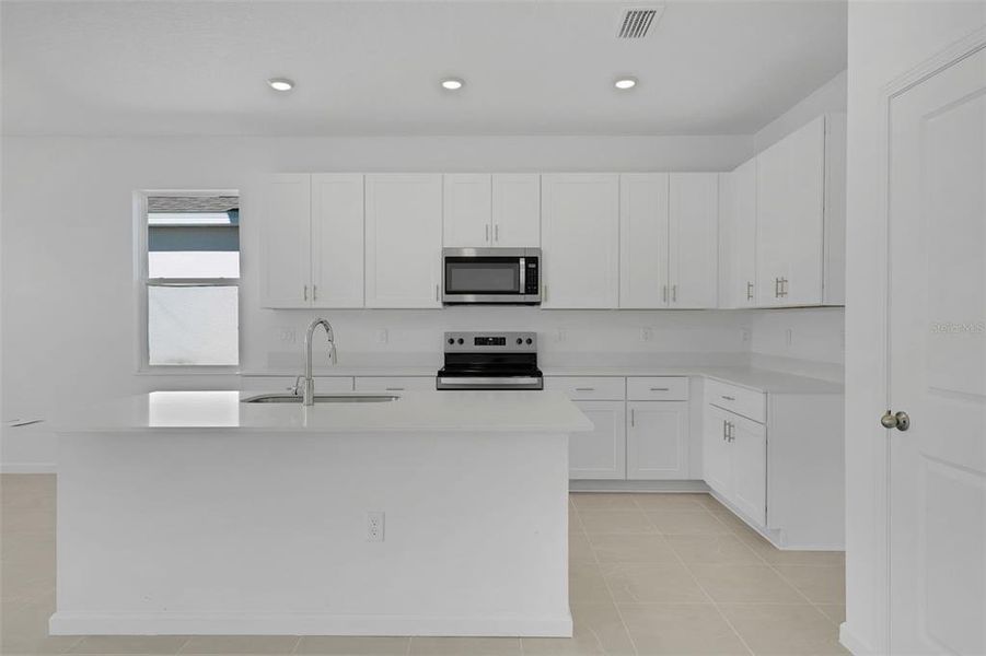 Furnished interior view inside a new home in Willowbrook North, Winter Haven (Image 9).