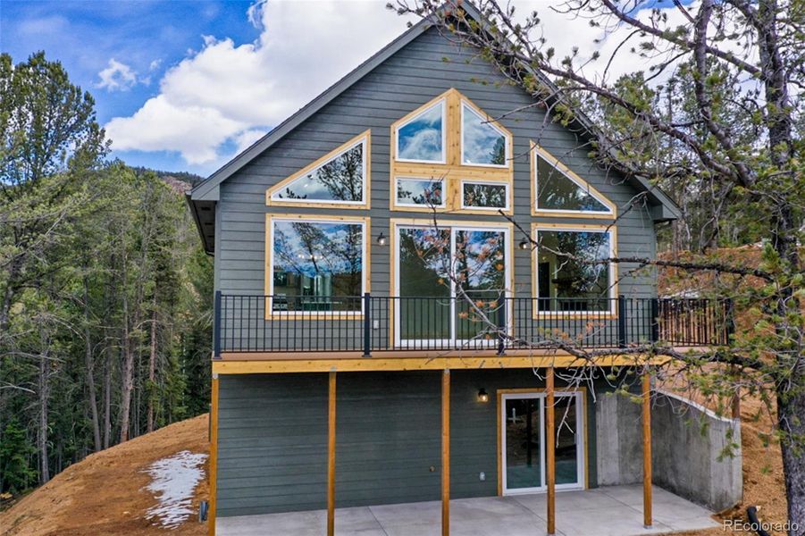 Front exterior of a new home in , Divide, CO, highlighting curb appeal (Image 25). Front exterior of a new home in , Divide, CO, highlighting curb appeal (Image 25).