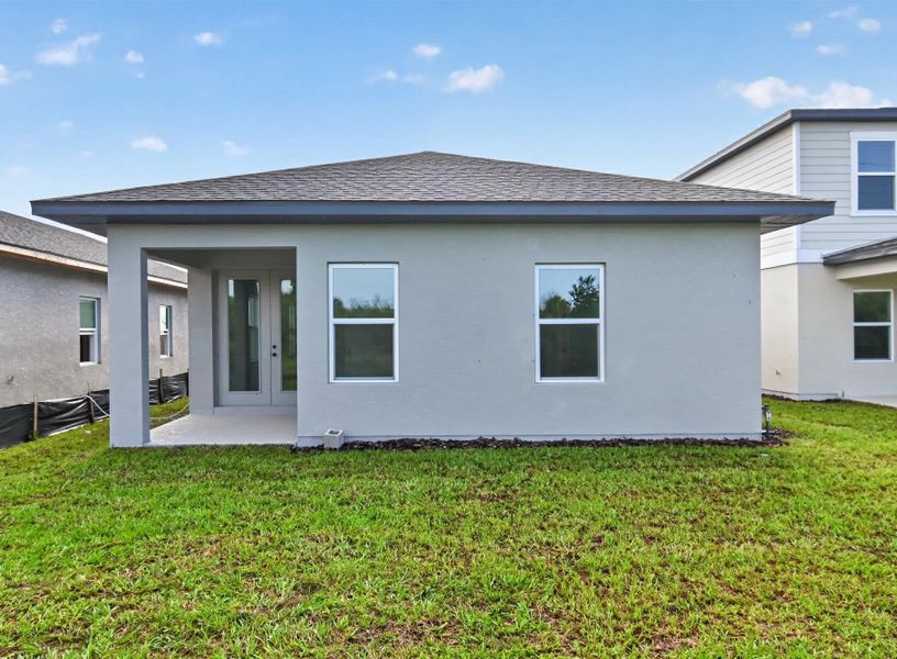 Exterior details and patio area of a home in Catamaran Cove, Rockledge (Image 3).