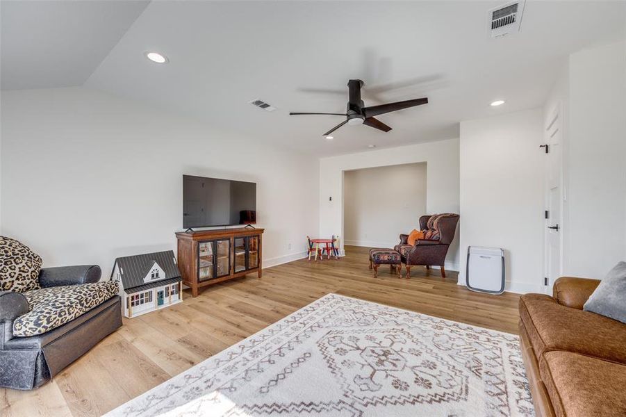 The upstairs bonus room offers much versatility for use and enjoyment.