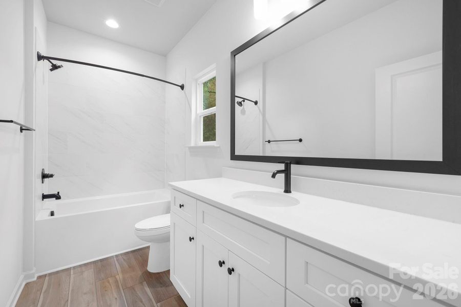 Furnished interior view inside a new home in , Huntersville (Image 9).