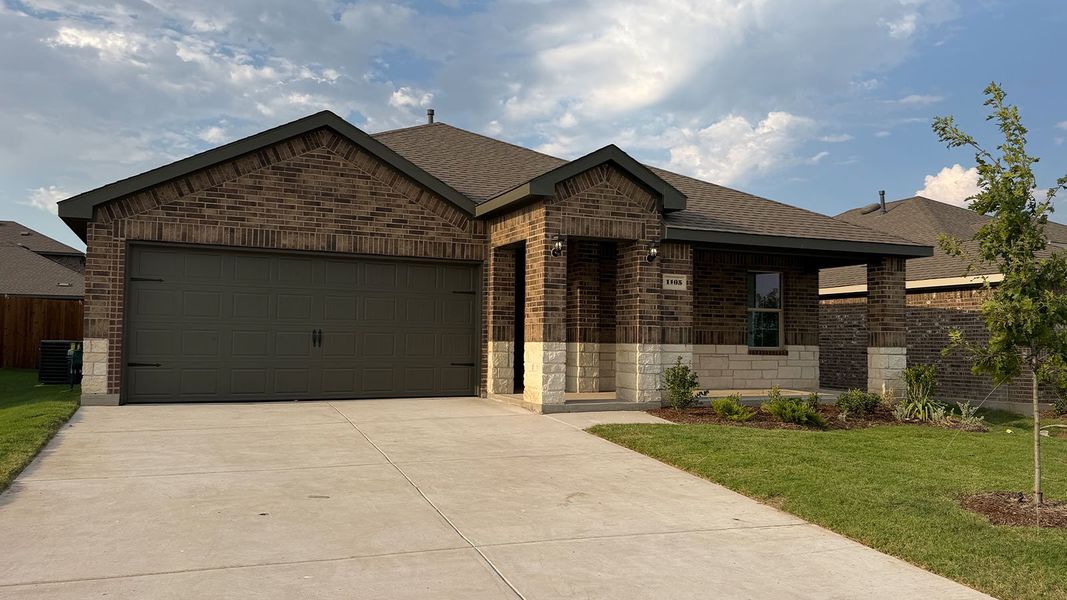 Front exterior of a new home in Riverfield, Josephine, TX, highlighting curb appeal (Image 2). Front exterior of a new home in Riverfield, Josephine, TX, highlighting curb appeal (Image 2).