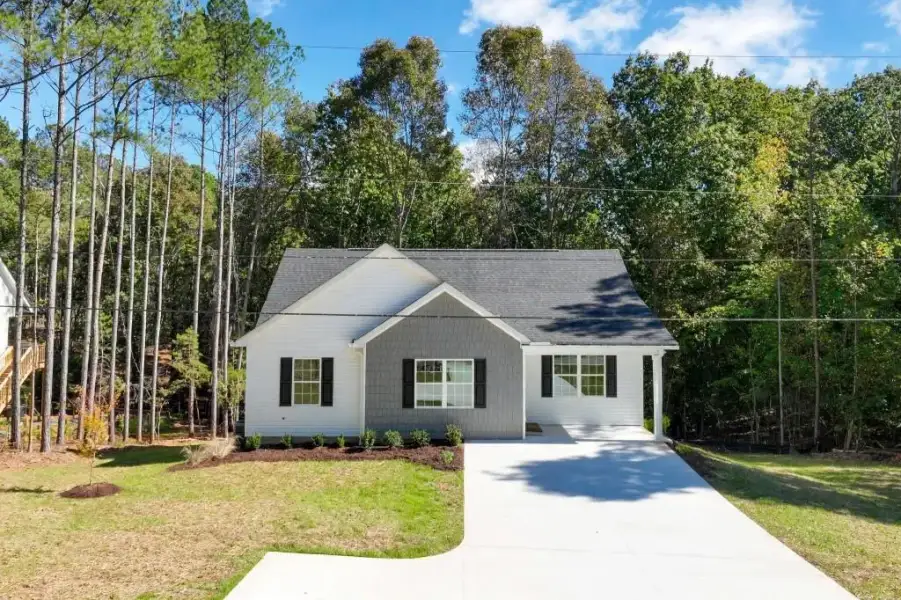 Front exterior of a new home in , Lula, GA, highlighting curb appeal (Image 19).