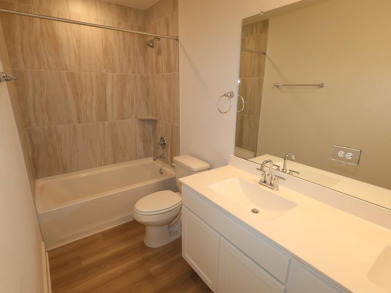 Furnished interior view inside a new home in Lone Star Landing, Montgomery (Image 14).