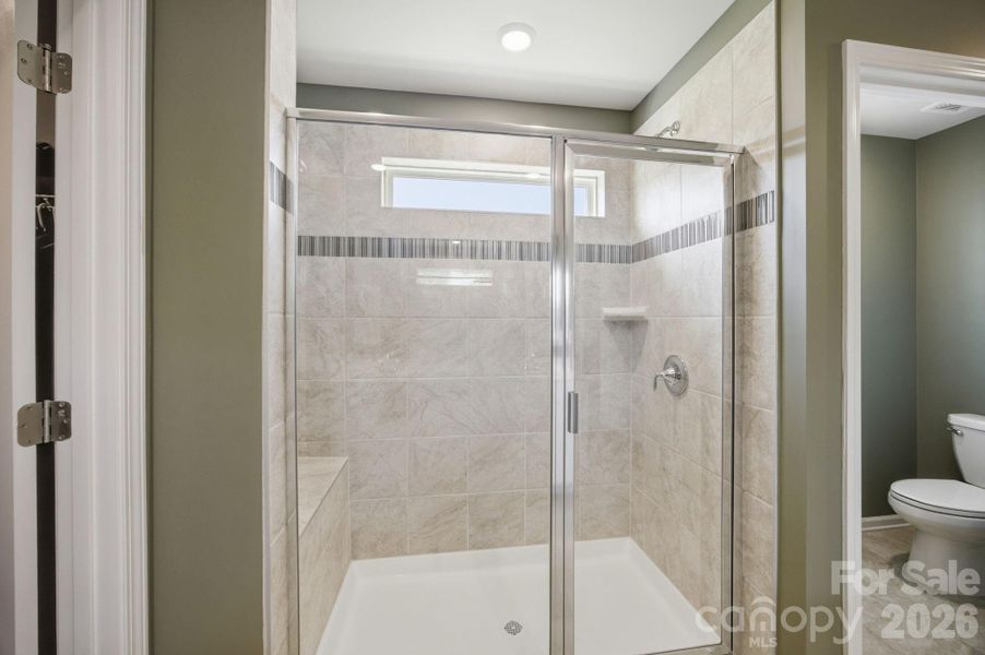 Furnished interior view inside a new home in Falls Cove at Lake Norman, Troutman (Image 32).