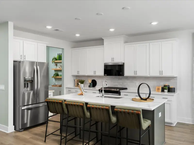 Furnished interior view inside a new home in The Coves at Lakes of Cane Bay, Summerville (Image 10).