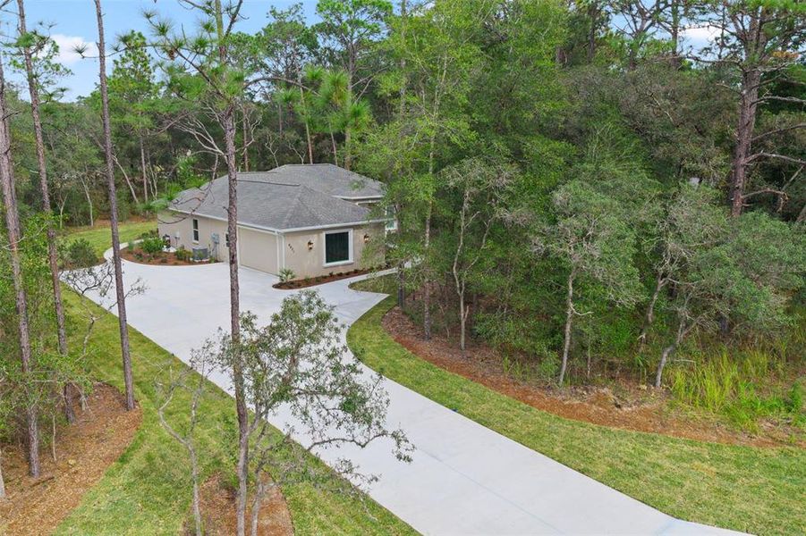 Front exterior of a new home in , Beverly Hills, FL, highlighting curb appeal (Image 27).