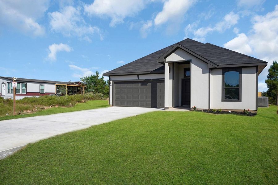 Front exterior of a new home in , Cleveland, TX, highlighting curb appeal (Image 1). Front exterior of a new home in , Cleveland, TX, highlighting curb appeal (Image 1).