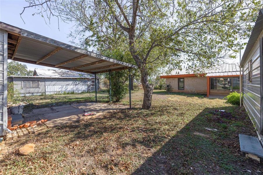Exterior details and patio area of a home in , Brownwood (Image 21).