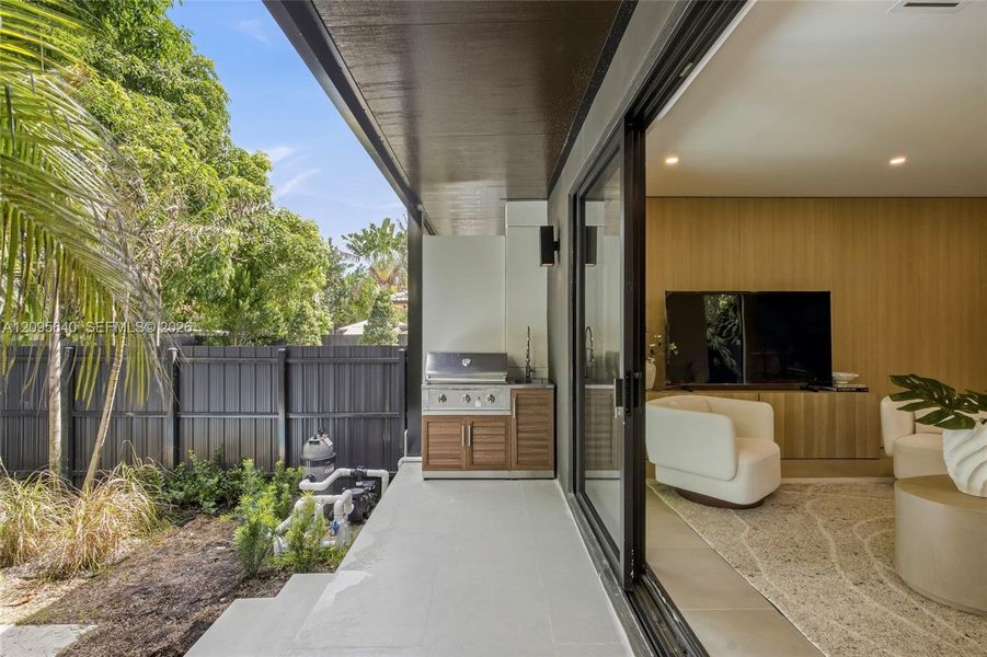 Exterior details and patio area of a home in , Miami (Image 3).