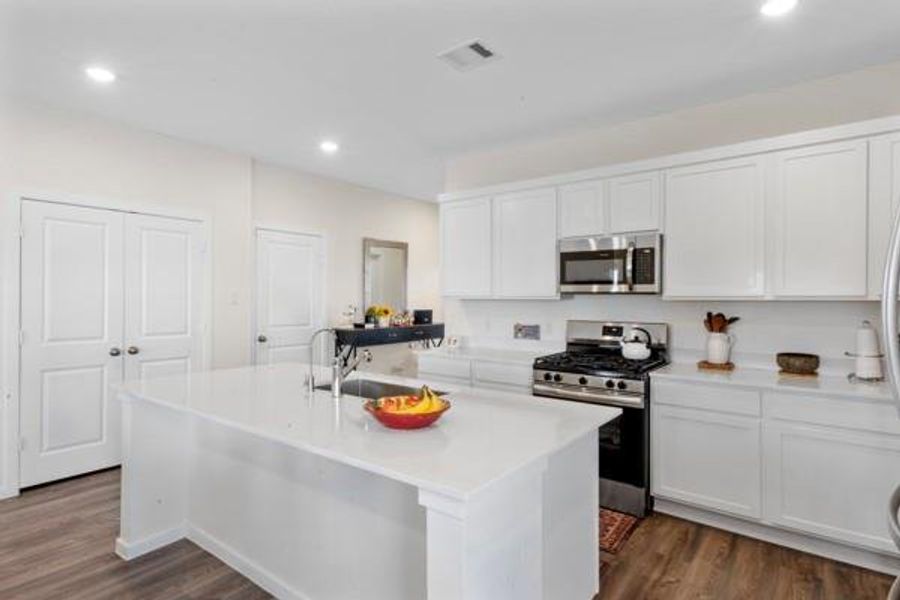 Furnished interior view inside a new home in Sterling Point at Baytown Crossings: Wildflower II Collection, Baytown (Image 15).
