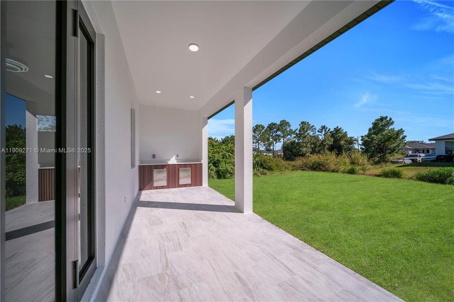 Exterior details and patio area of a home in , Lehigh Acres (Image 3).
