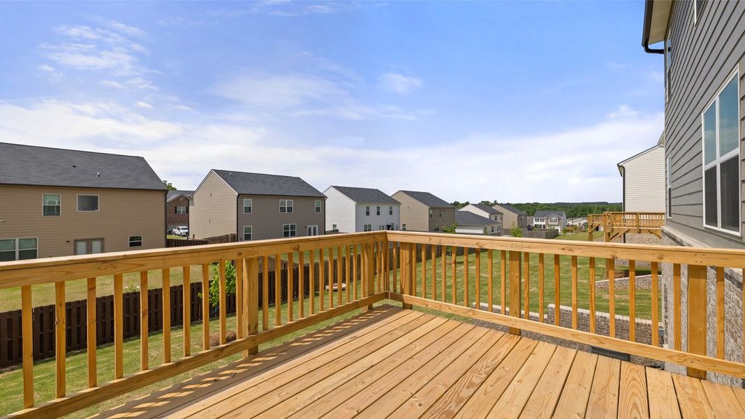 Exterior details and patio area of a home in Brooks Station, Dacula (Image 2).
