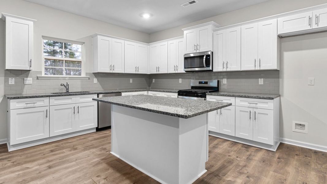 Furnished interior view inside a new home in The Landing at Summerhaven, Mebane (Image 6).