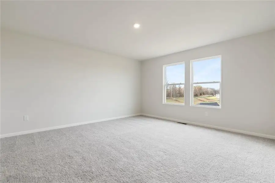 Spacious, unfurnished interior of a new home in Liberty Pointe, Villa Rica (Image 24).