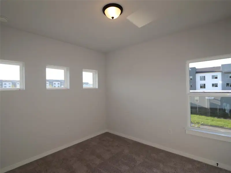 Spacious, unfurnished interior of a new home in Estancia West, Manchaca (Image 13).