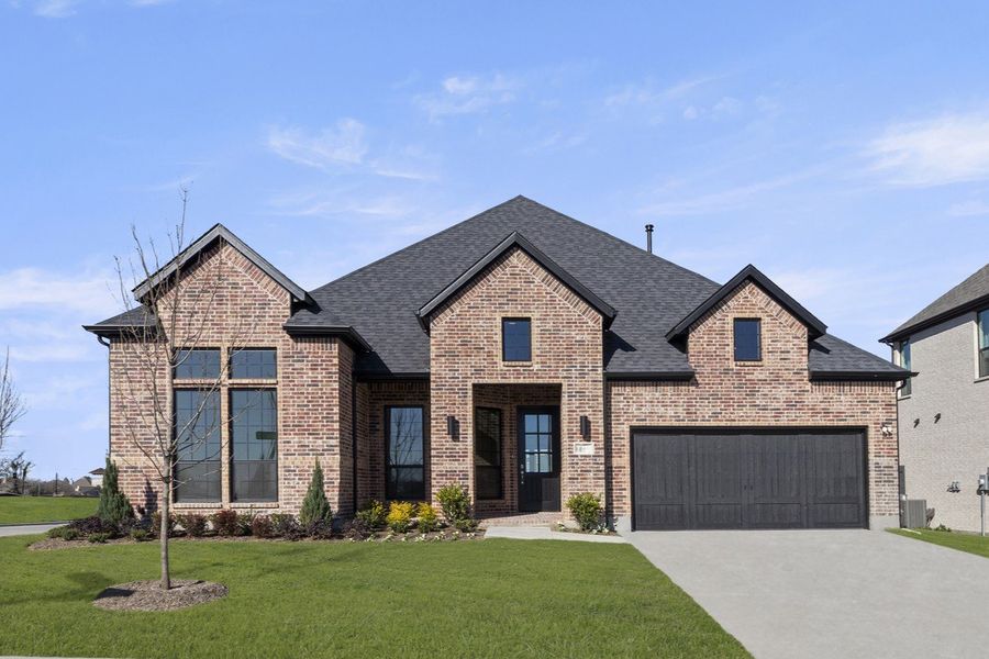 Front exterior of a new home in Nelson Lake Estates, Rockwall, TX, highlighting curb appeal (Image 1). Front exterior of a new home in Nelson Lake Estates, Rockwall, TX, highlighting curb appeal (Image 1).