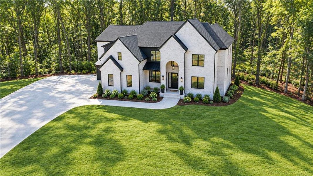 Front exterior of a new home in , Bethlehem, GA, highlighting curb appeal (Image 6).