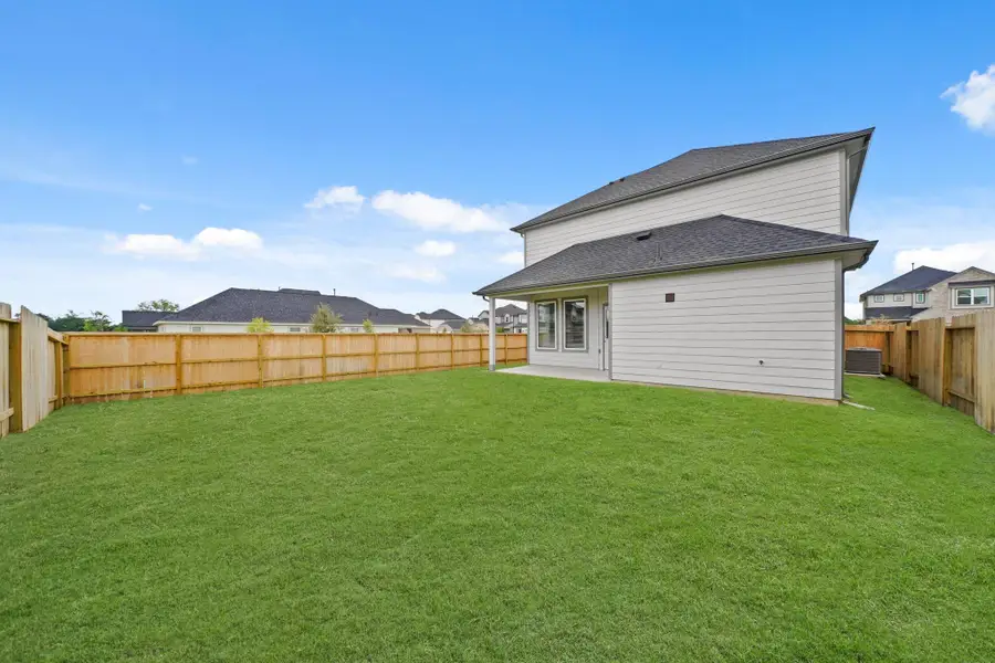 Exterior details and patio area of a home in Grand Oaks Village, Houston (Image 4). Exterior details and patio area of a home in Grand Oaks Village, Houston (Image 4).