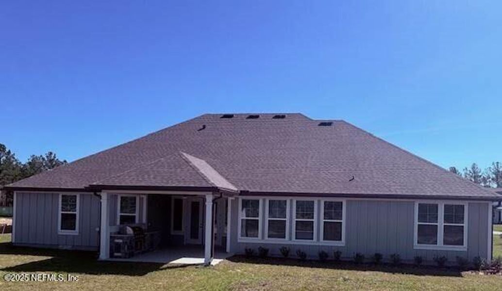 Front exterior of a new home in , Hilliard, FL, highlighting curb appeal (Image 1). Front exterior of a new home in , Hilliard, FL, highlighting curb appeal (Image 1).