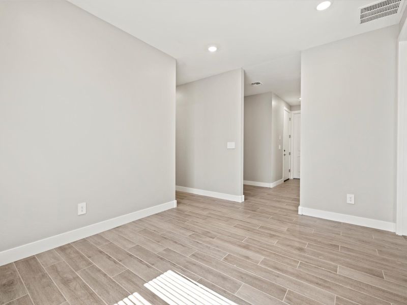 Spacious, unfurnished interior of a new home in Blossom Rock Reserve Series, Apache Junction (Image 11). Spacious, unfurnished interior of a new home in Blossom Rock Reserve Series, Apache Junction (Image 11).
