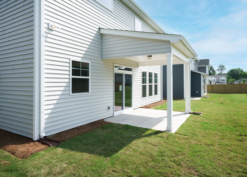 Representative exterior photo of a completed home built from the The Harrison by Cothran Homes in Holly Ridge, Greenville, SC (Image 31). Representative exterior photo of a completed home built from the The Harrison by Cothran Homes in Holly Ridge, Greenville, SC (Image 31).