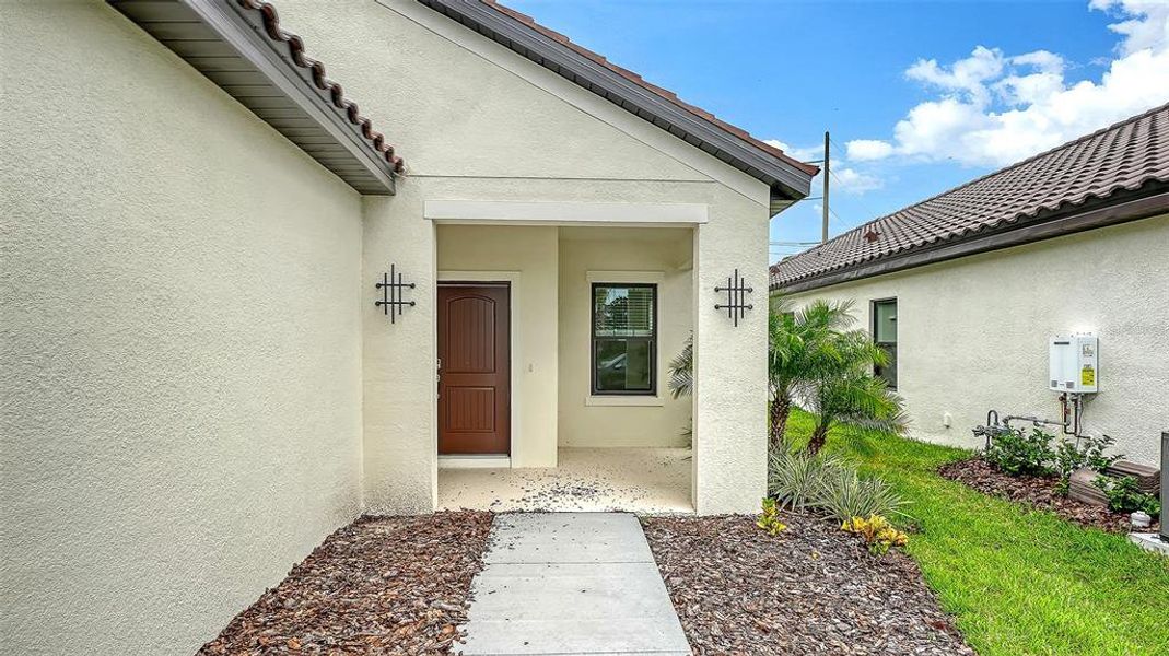 Exterior details and patio area of a home in Vicenza Real Estate and Homes for Sale in North Venice, FL - Neal Communities, Nokomis (Image 3). Exterior details and patio area of a home in Vicenza Real Estate and Homes for Sale in North Venice, FL - Neal Communities, Nokomis (Image 3).