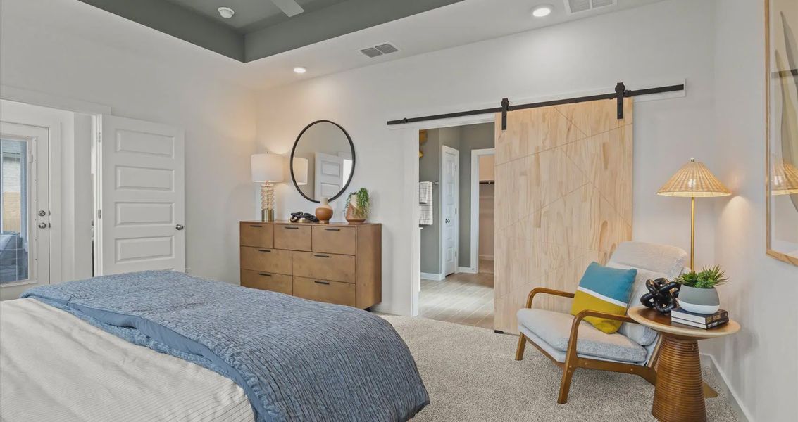 Representative furnished interior of a home built from the Davis by Chesmar Homes in Stream Waters, Buda (Image 25).