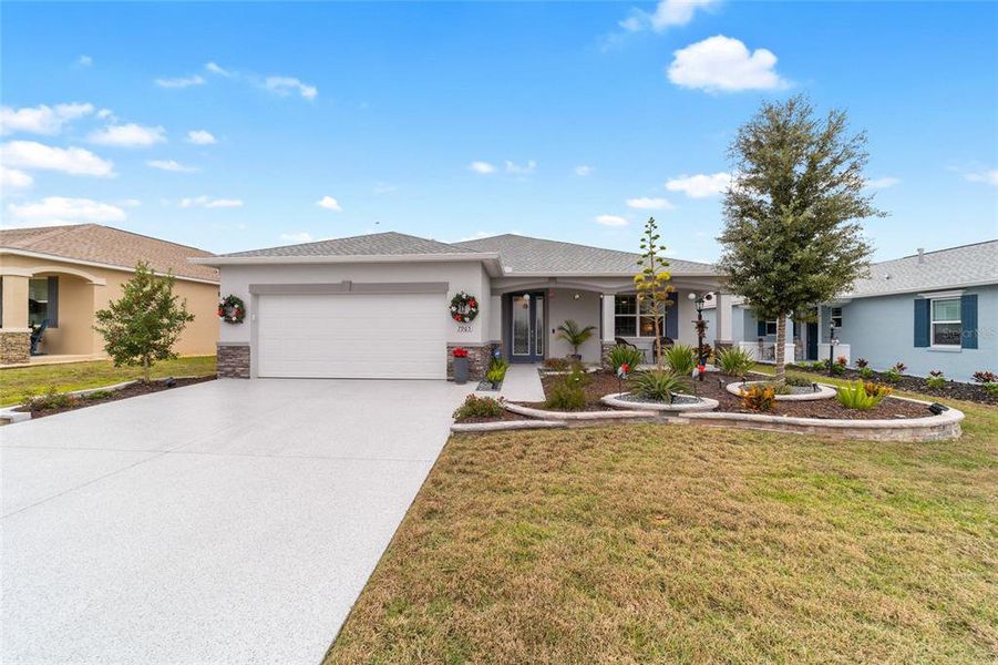 Front exterior of a new home in , Ocala, FL, highlighting curb appeal (Image 1). Front exterior of a new home in , Ocala, FL, highlighting curb appeal (Image 1).