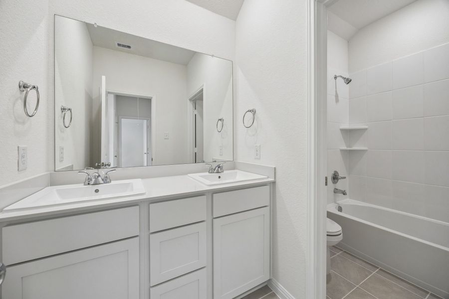 Furnished interior view inside a new home in Riviera Pines, Huffman (Image 32).