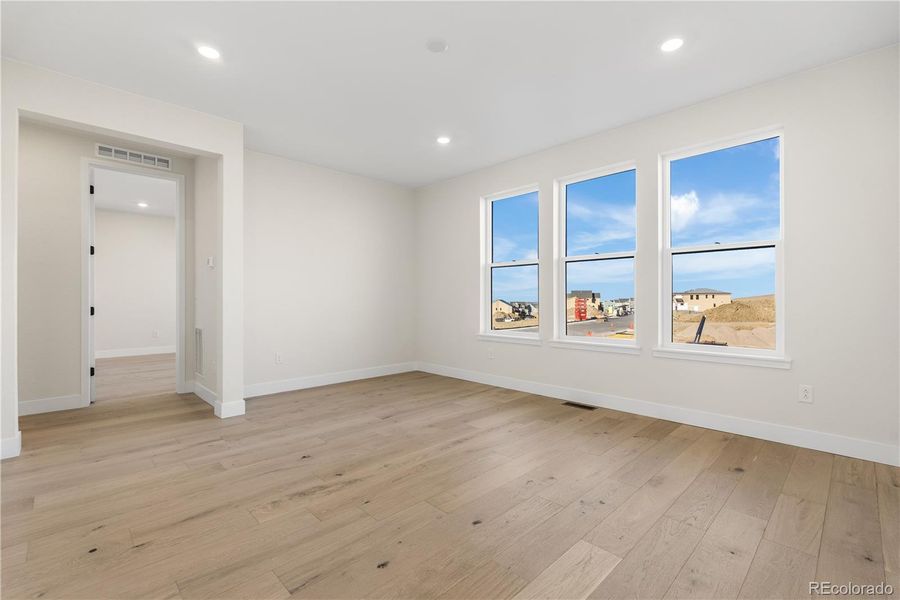 Spacious, unfurnished interior of a new home in Autograph at Lyric, Lone Tree (Image 46).