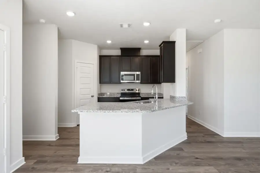 Furnished interior view inside a new home in The Cottages at Pagosa Springs, Bryan (Image 3).