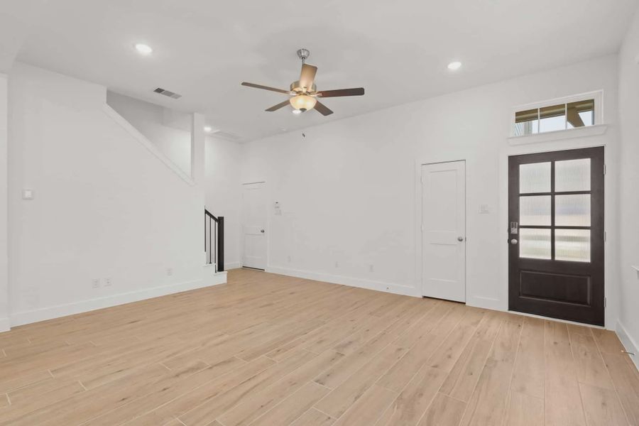 Representative unfurnished interior of a home built from the Cheverny by Chesmar Homes in Santa Rita Ranch, Liberty Hill (Image 9).