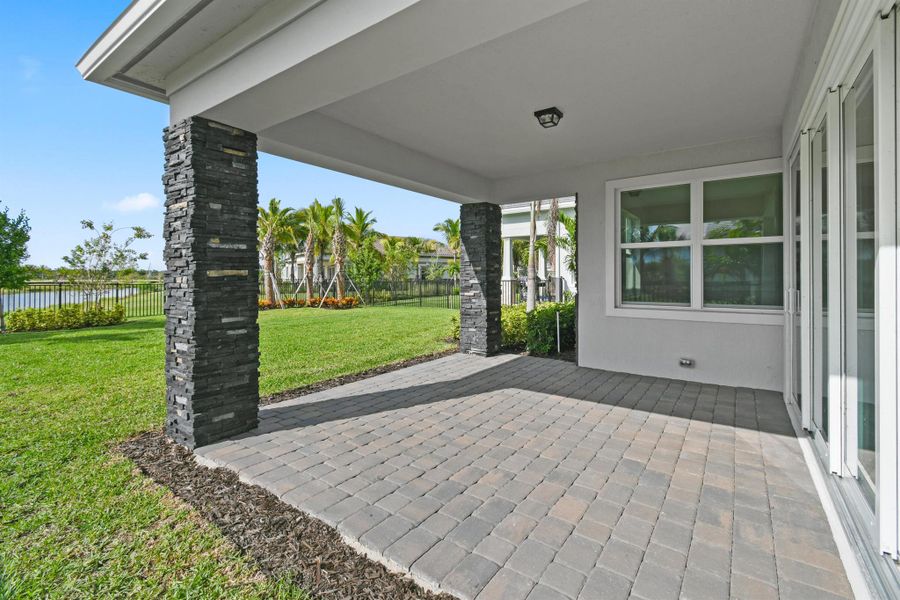 Exterior details and patio area of a home in Avondale at Avenir, Palm Beach Gardens (Image 3).