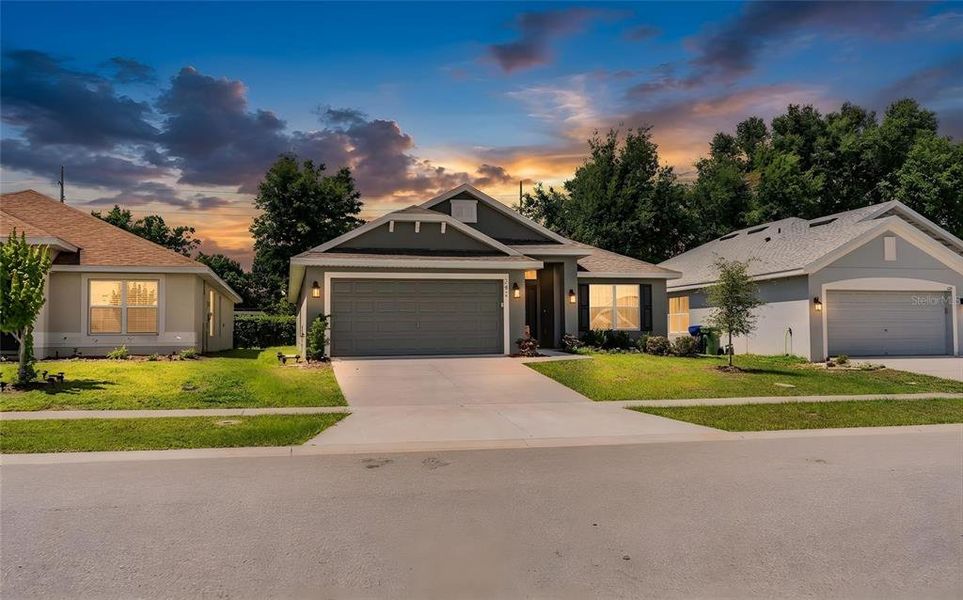 Front exterior of a new home in , Winter Haven, FL, highlighting curb appeal (Image 26).