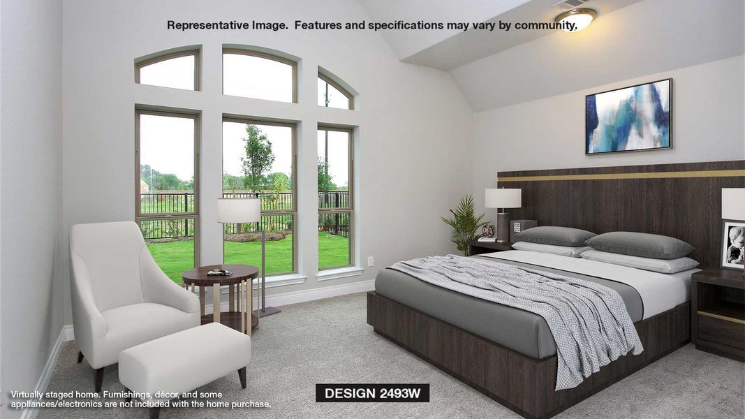 Bedroom featuring carpet floors and lofted ceiling