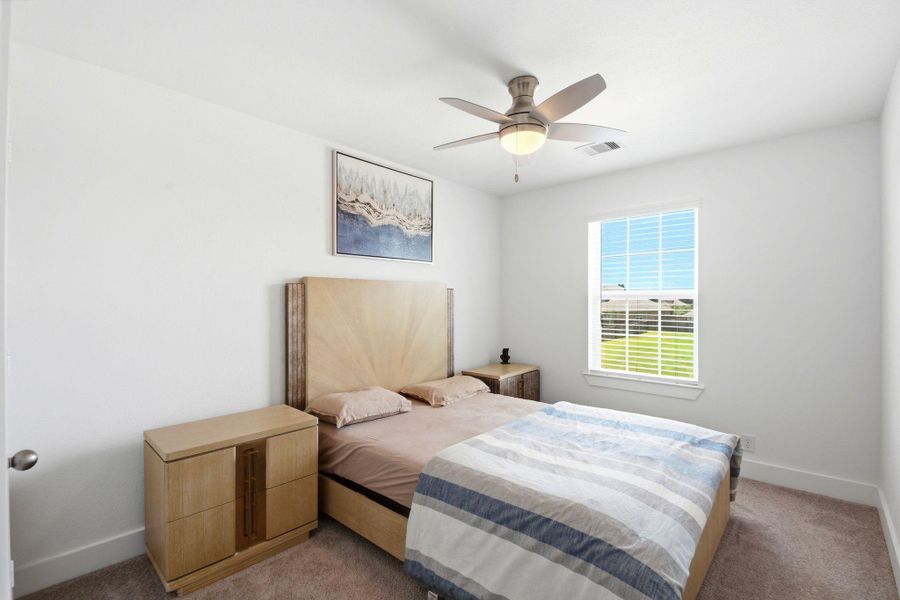 Furnished interior view inside a new home in Massey Oaks, Pearland (Image 34).