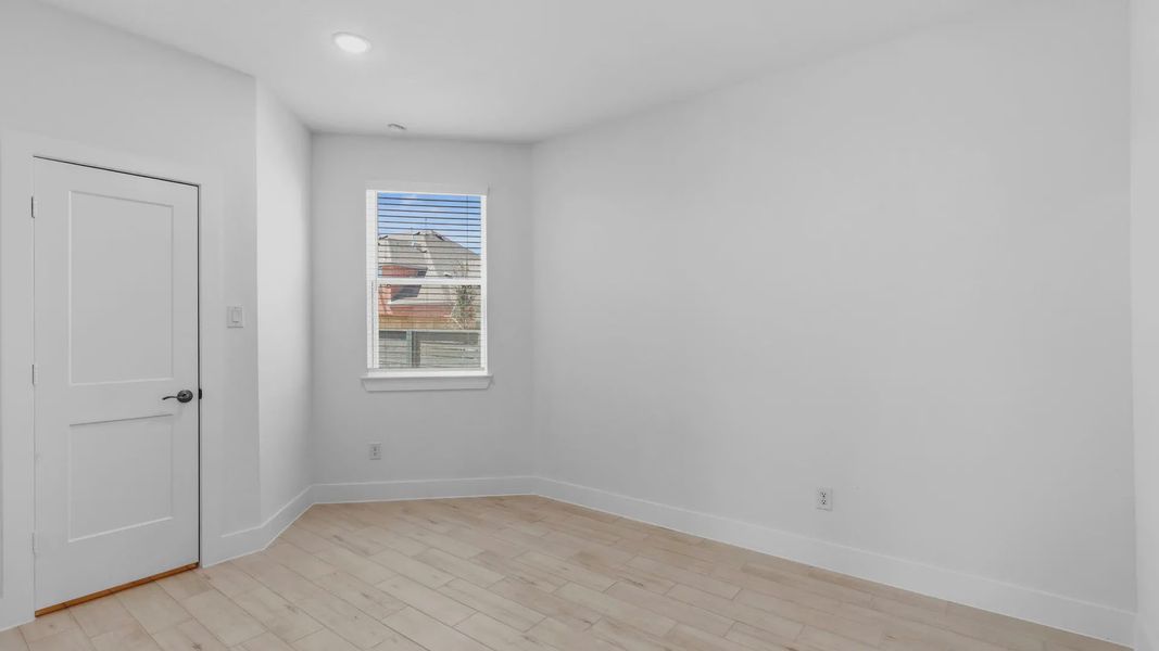 Representative unfurnished interior of a home built from the Oakdale by Chesmar Homes in Bridgeland Courtyard, Cypress (Image 27).