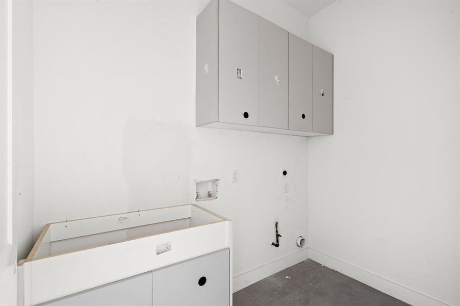 Walk-in utility room with storage