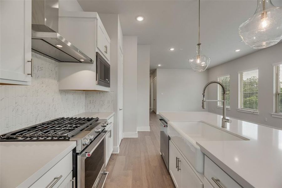 Furnished interior view inside a new home in Collin Creek, Plano (Image 6).