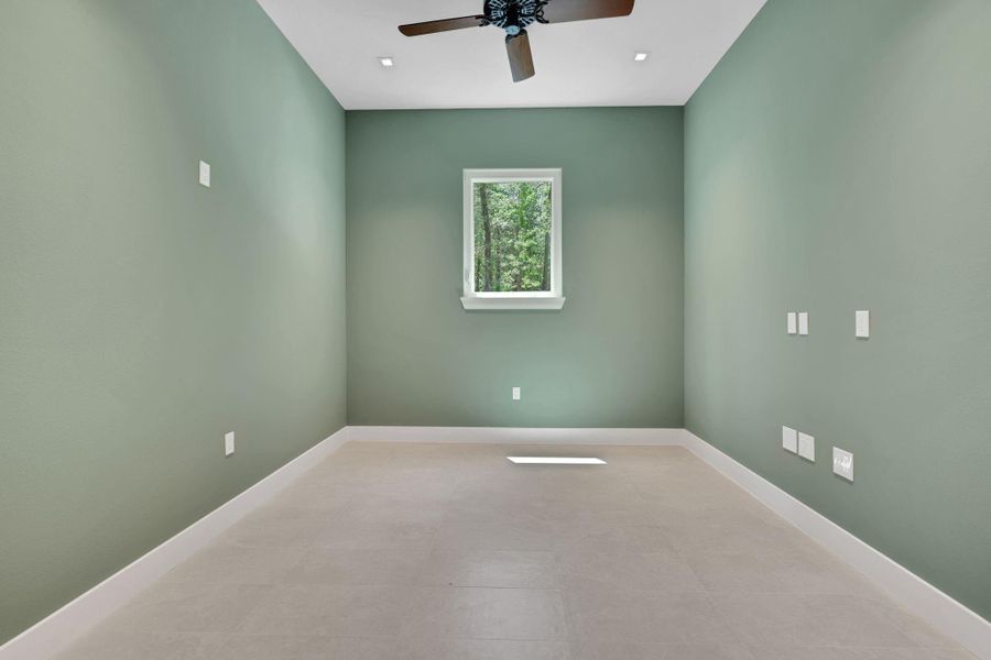 Flexible bonus room ideal as a home office, formal dining, or playroom