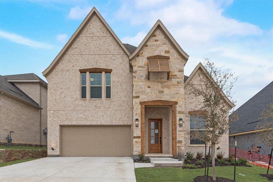 Front exterior of a new home in Hillside Village, Celina, TX, highlighting curb appeal (Image 25).