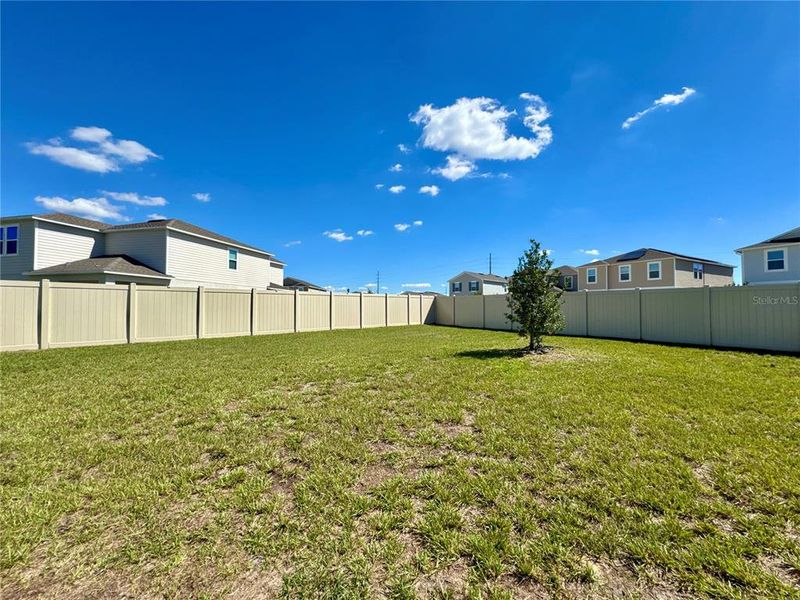 Exterior details and patio area of a home in Marion Creek, Haines City (Image 20).