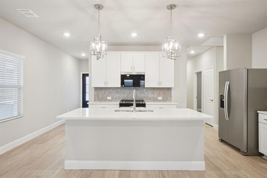 Furnished interior view inside a new home in Parks at Foster Crossing - Spring Series, Anna (Image 11).
