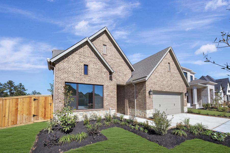 Front exterior of a new home in Kresston, Montgomery, TX, highlighting curb appeal (Image 2).